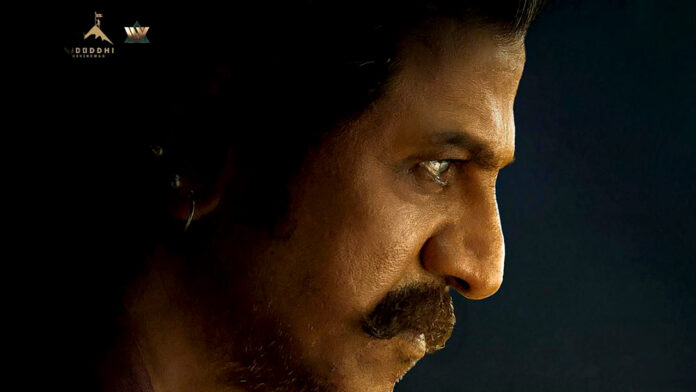 shiva-rajkumars-intense-first-look-from-ram-charans-peddi