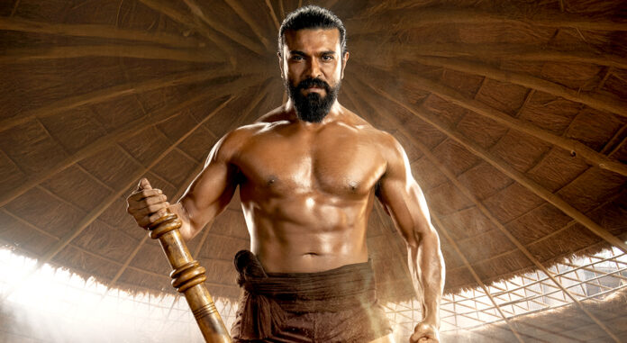 ram-charan-stuns-in-fierce-pehalwan-avatar-for-peddi-poster-on-hanuman-jayanthi